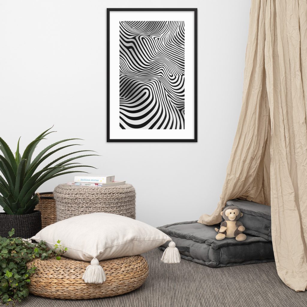 A cozy reading nook with cushions, a plush toy, a plant, and abstract wall art.