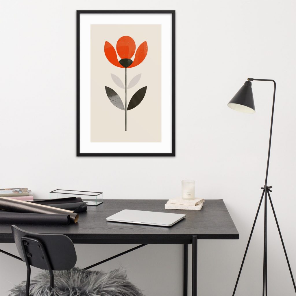Minimalist office with framed floral artwork.