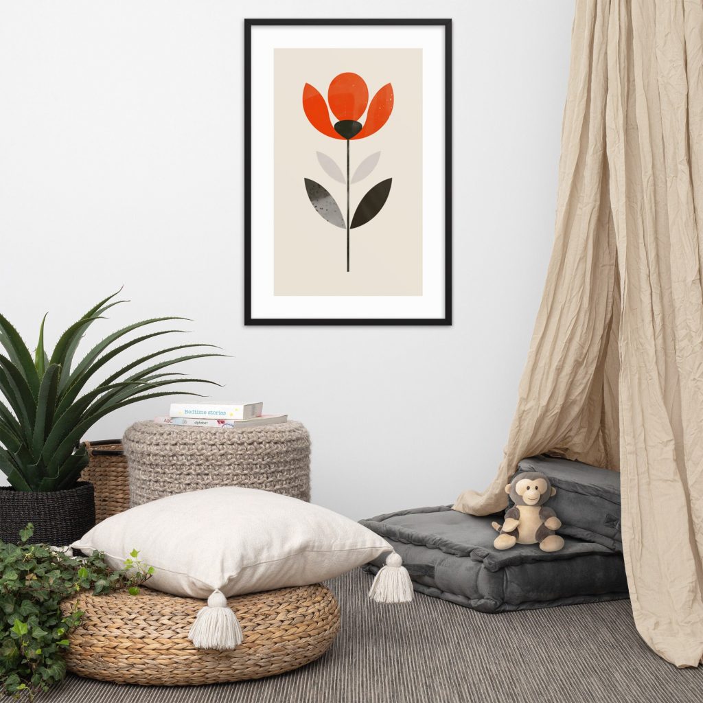 A cozy reading nook with cushions, a plant, a toy monkey, and a framed flower print on the wall.