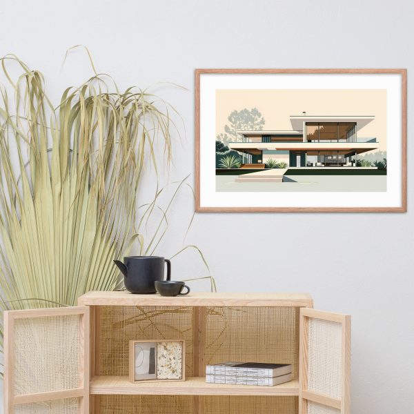 A framed modern house illustration hangs above a wooden cabinet with a black teapot on top.