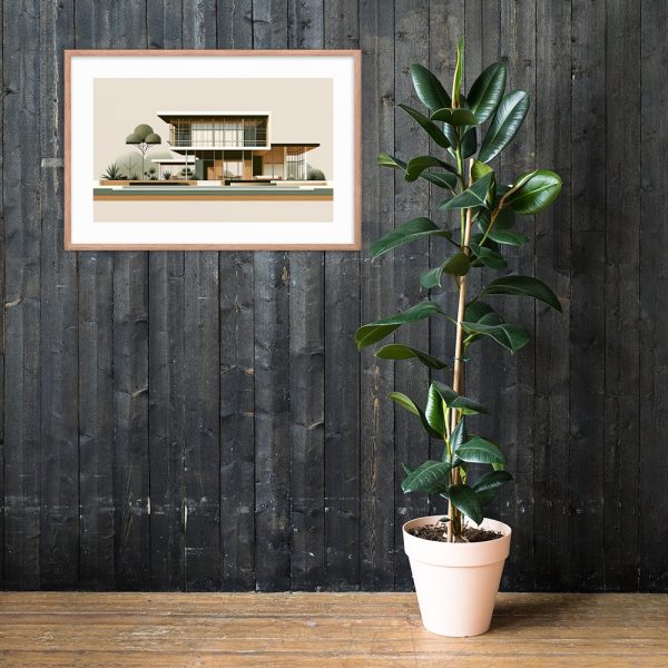A potted plant stands in front of a dark wooden wall, with a framed artwork hanging above it.