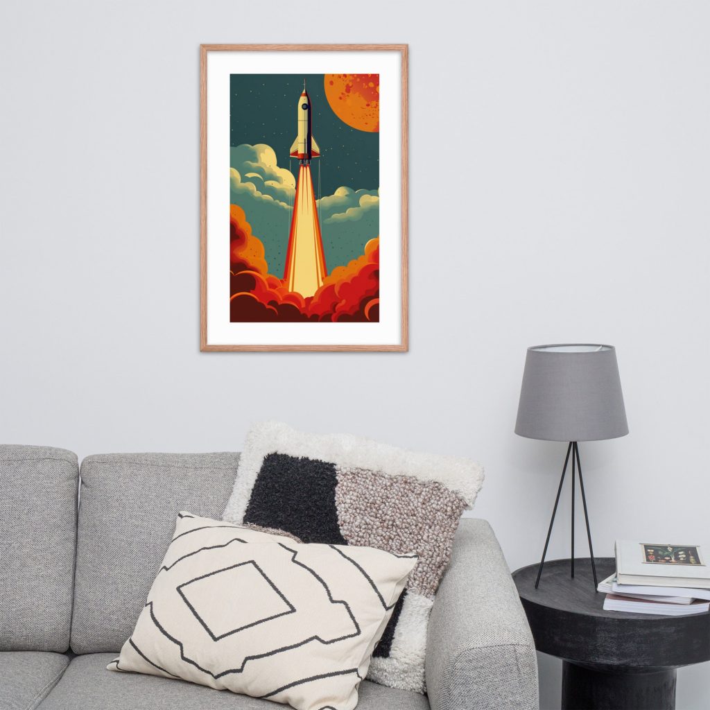 Framed rocket launch artwork on a wall above a sofa and next to a lamp and table.