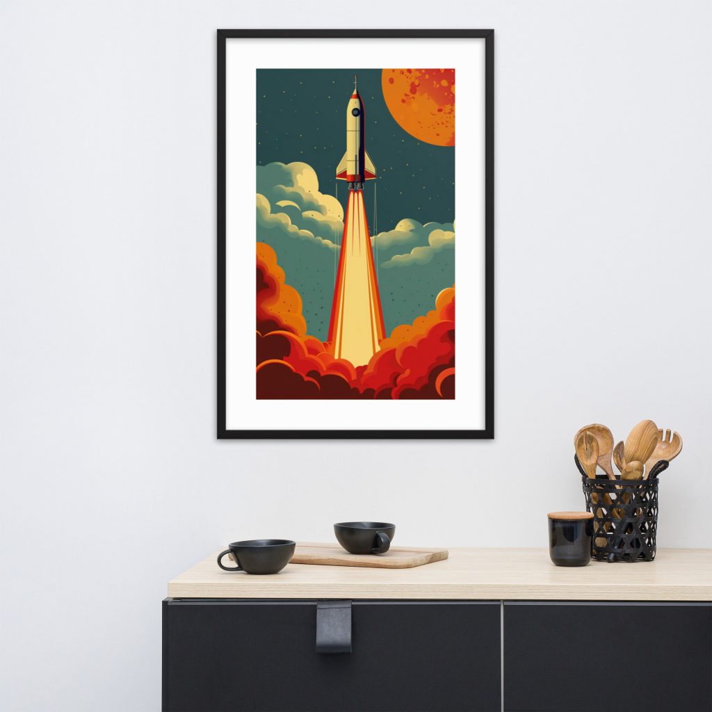 A framed rocket launch illustration, hanging above a minimalist cabinet with kitchen utensils.