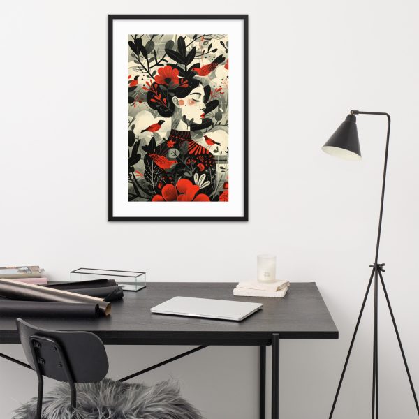 Abstract floral artwork above a minimalist desk with a black chair and lamp.