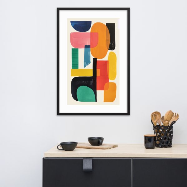 Colorful abstract art print in black frame above modern black sideboard.