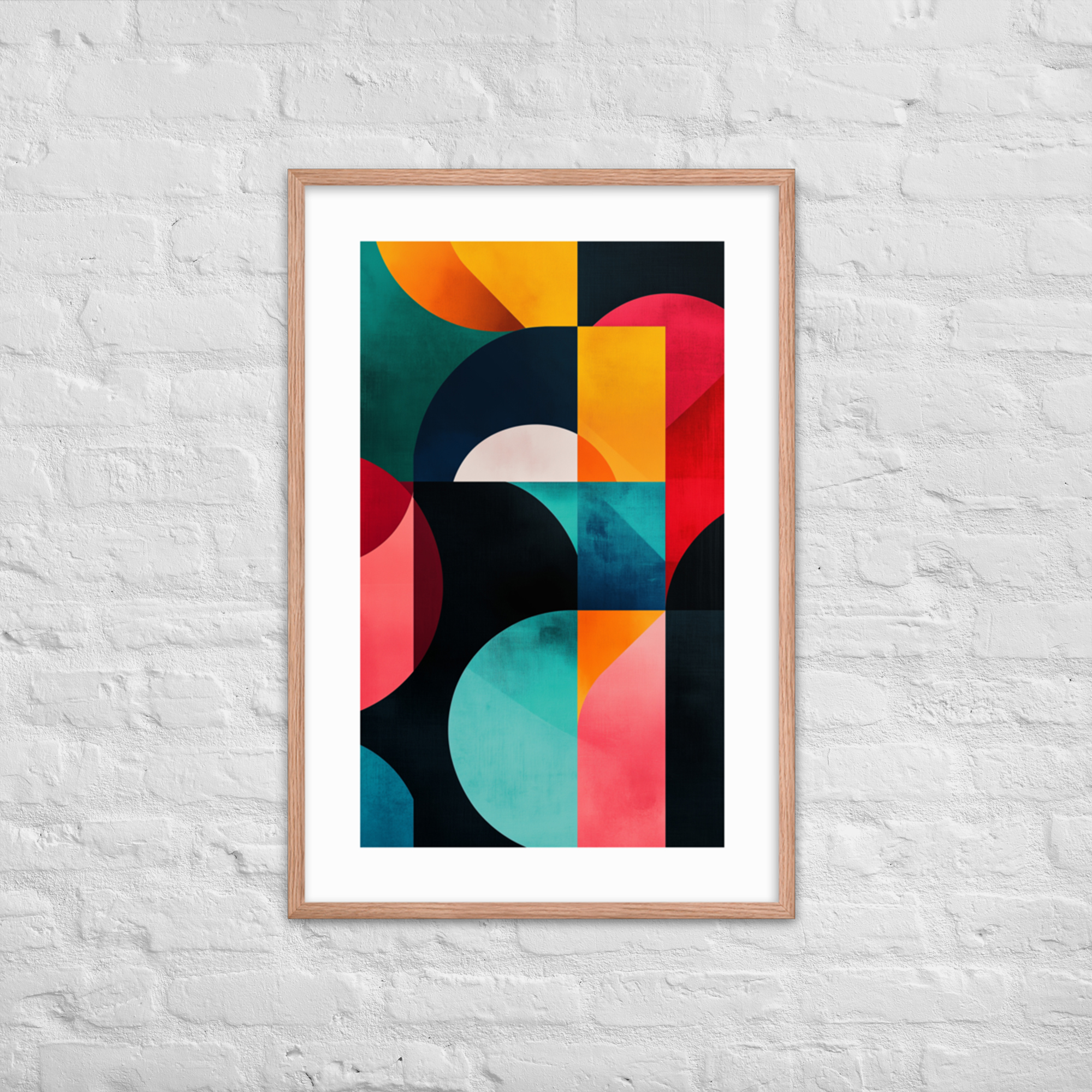 A framed abstract geometric print featuring vibrant colors displayed on a white brick wall.