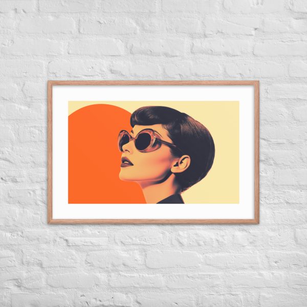 A framed pop art portrait of a woman wearing sunglasses against a white brick wall.