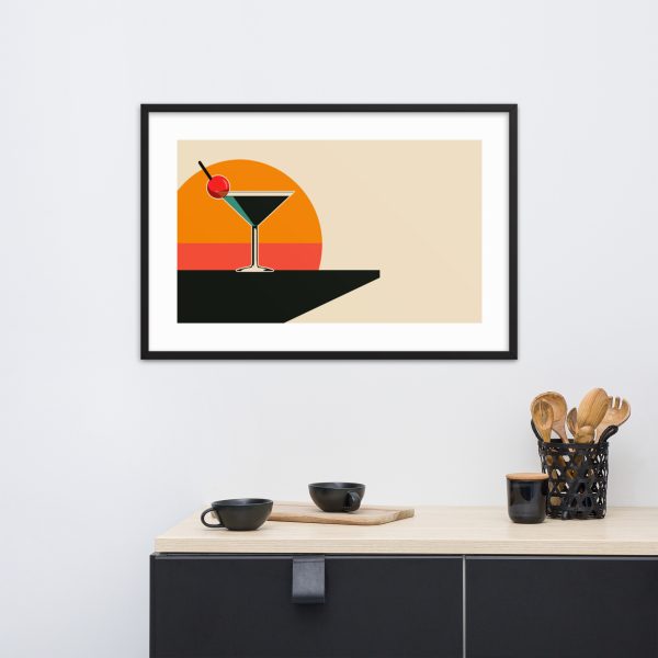 Framed minimalist artwork of cocktail above a modern kitchen cabinet