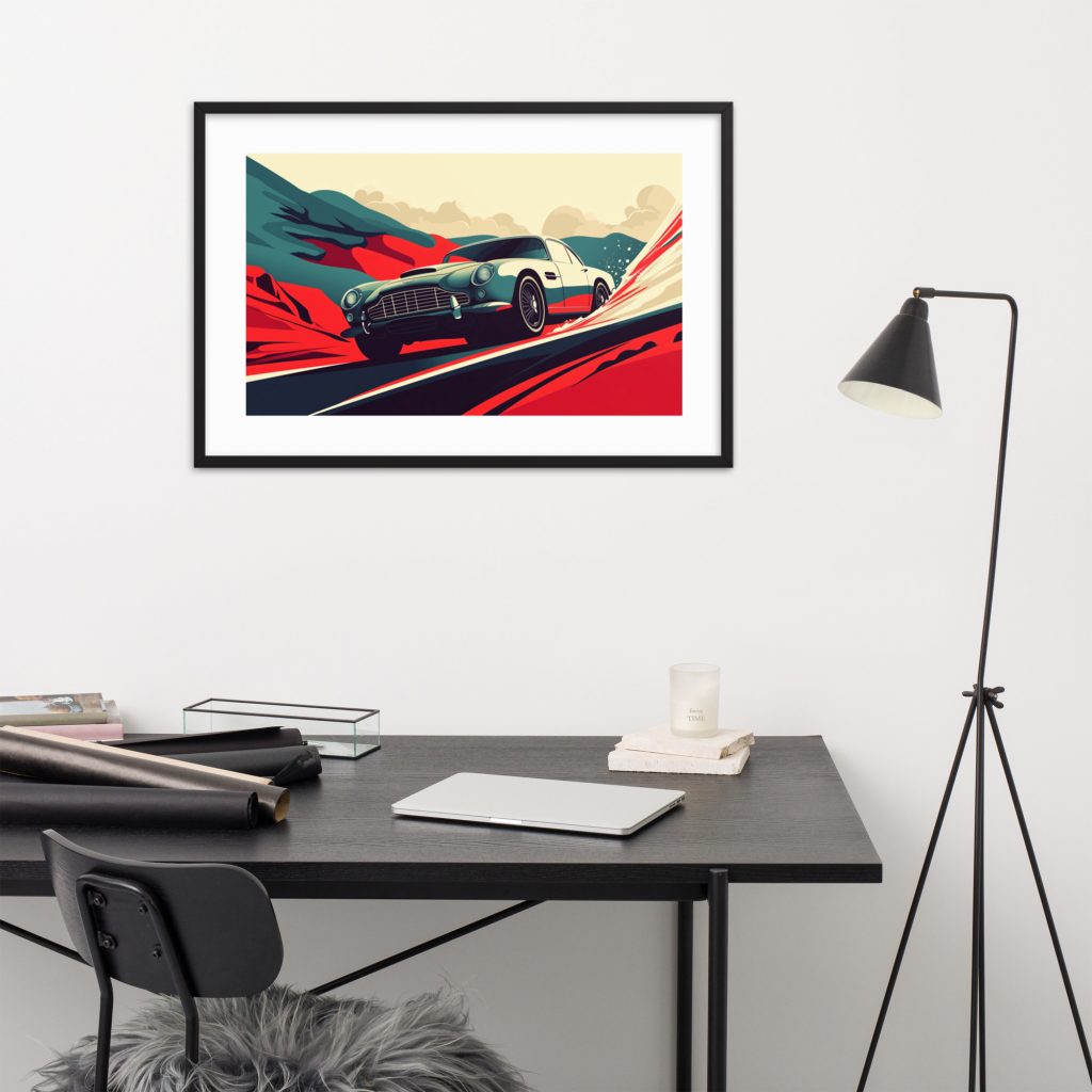 Modern workspace with a framed vintage car artwork.