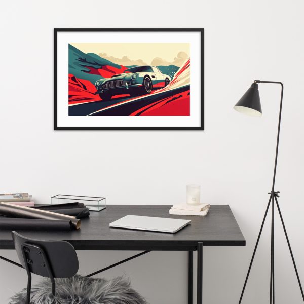 Modern workspace with a framed vintage car artwork.