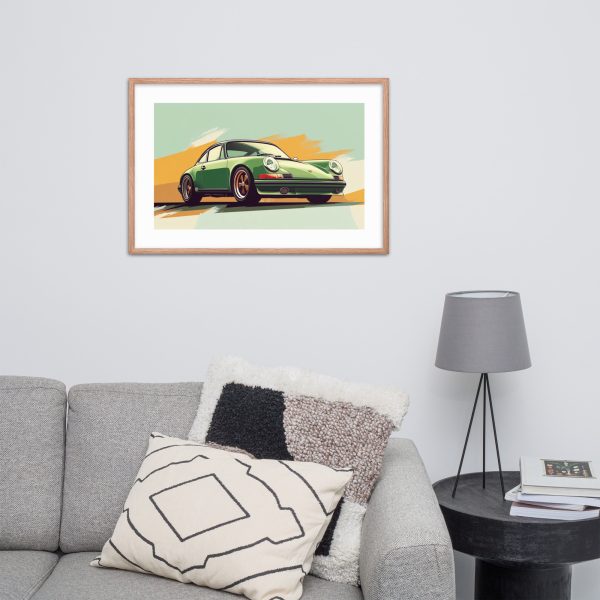 Framed car artwork above a modern grey sofa and a side table with a lamp.