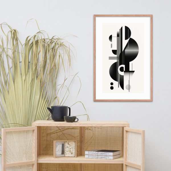 Modern minimalist decor with framed abstract artwork and wooden cabinet.