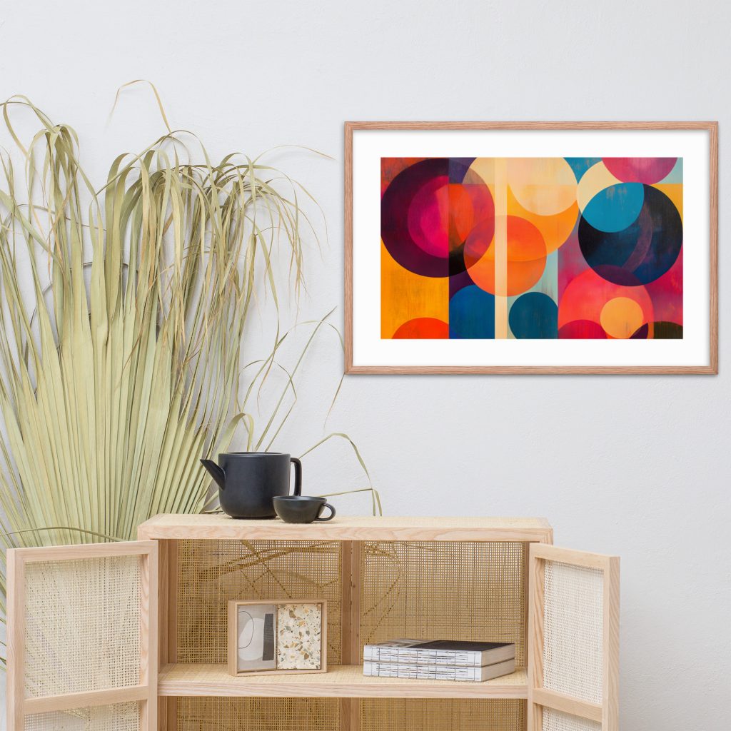 Framed geometric art above a wooden cabinet with potted plant.