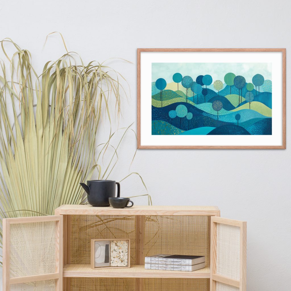 Framed landscape artwork above modern cabinet with decor.