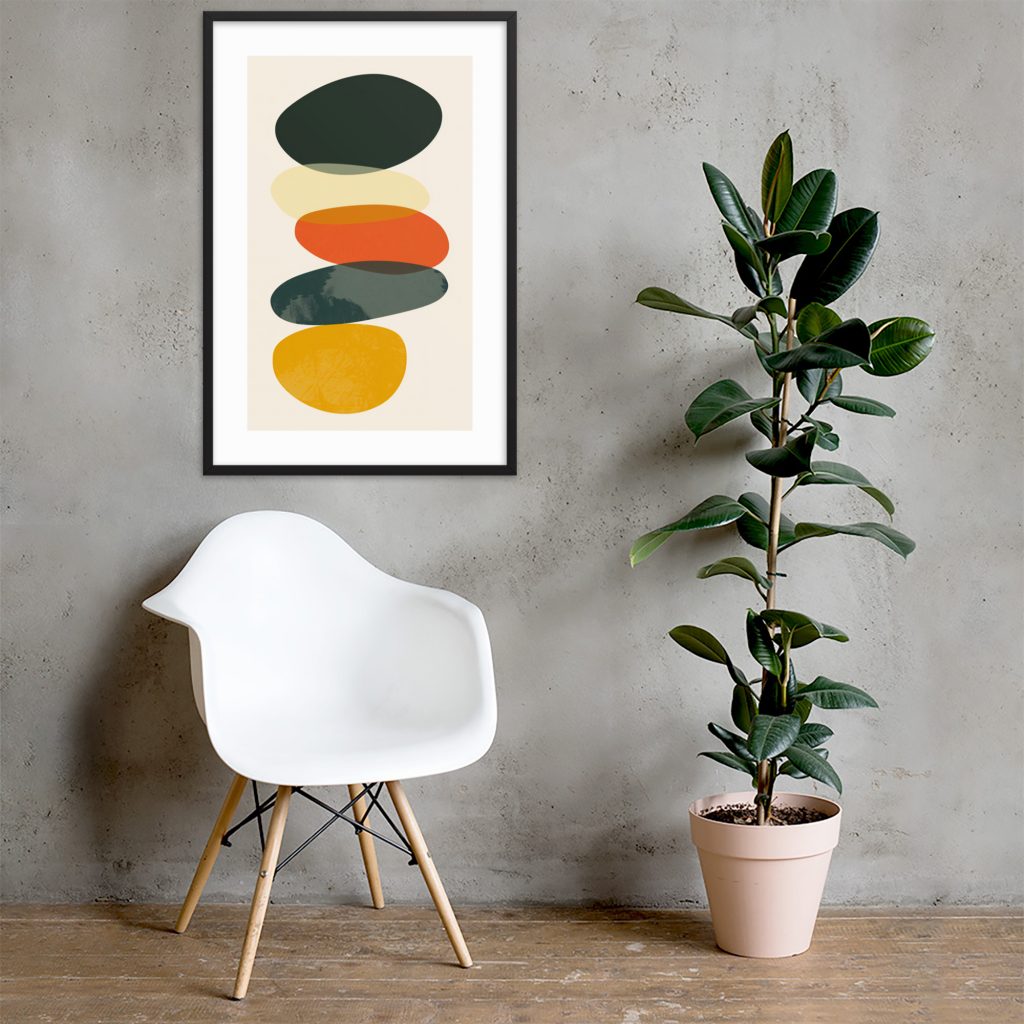 A modern chair, abstract art, and a tall plant beside a gray wall.